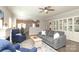 Open living space with a view into the dining room and kitchen, showcasing hardwood floors at 363 Bellingrath Blvd, Rock Hill, SC 29730