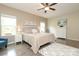 Spacious bedroom with a ceiling fan, natural light, and neutral decor, creating a serene retreat at 363 Bellingrath Blvd, Rock Hill, SC 29730