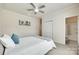 Comfortable bedroom with a full-sized bed, ceiling fan, and an ensuite bathroom at 4023 Spring Garden St, Fort Mill, SC 29715