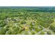 Aerial view of a residential neighborhood with well-maintained lawns and tree-lined streets at 405 W Ormand Ave, Bessemer City, NC 28016