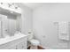 This bathroom features a white vanity, modern fixtures, and a coordinated color scheme at 405 W Ormand Ave, Bessemer City, NC 28016