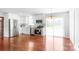 Open concept kitchen with stainless steel appliances, bright dining area with slider door at 405 W Ormand Ave, Bessemer City, NC 28016