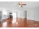 Bright and open living space flows into a modern kitchen with stainless steel appliances at 405 W Ormand Ave, Bessemer City, NC 28016