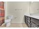 Neutral toned bathroom with a toilet, vanity with drawers and a shower with curtain at 4243 Merrivale Dr, Lancaster, SC 29720