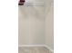 A closet interior featuring neutral walls, carpet, and a wire shelving system for organized storage at 4243 Merrivale Dr, Lancaster, SC 29720