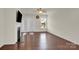 Open living area featuring hardwood floors, a fireplace, ceiling fan and natural light at 4243 Merrivale Dr, Lancaster, SC 29720