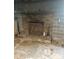 A traditional brick fireplace with copper accents, in need of cleaning at 4268 Wilkesboro Hwy, Statesville, NC 28625