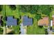 Aerial view of home showcasing its roof, surrounding landscaping, and proximity to nearby properties at 4914 Ridgeley Dr, Charlotte, NC 28208
