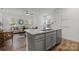 Spacious island kitchen with granite countertops, stainless steel appliances, and an open layout at 5004 Cherry Gum Ct # 43, Matthews, NC 28105
