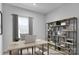 Office with natural light, workspace, and custom shelving at 5030 Grain Orchard Rd # 3025C, Indian Trail, NC 28079