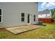 Backyard features patio and level ground, perfect for recreation and gatherings at 6322 Sydney Mae Ln, Charlotte, NC 28262