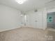 Neutral bedroom with carpet and view of natural light at 6322 Sydney Mae Ln, Charlotte, NC 28262
