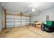 Spacious two-car garage with overhead lighting, perfect for storage and vehicles at 6322 Sydney Mae Ln, Charlotte, NC 28262