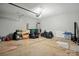 Large two-car garage with ample storage space, ready for organization and projects at 6322 Sydney Mae Ln, Charlotte, NC 28262