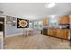 Eat-in kitchen with a dining area, features neutral walls and light wood cabinets at 653 Turner St, Mooresville, NC 28115