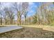 Expansive backyard with a concrete patio space and potential for landscaping and outdoor activities at 709 Catawba St, Lincolnton, NC 28092