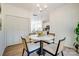 Bright dining room featuring a marble table, stylish chairs, and modern light fixture at 709 Catawba St, Lincolnton, NC 28092