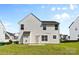 Exterior view of the rear of the house with vinyl siding at 7212 Ravanna Dr, Charlotte, NC 28213
