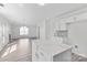 Open concept kitchen and living room with stone countertops and stainless steel appliances at 7212 Ravanna Dr, Charlotte, NC 28213