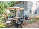 Charming backyard with a spacious deck, an outdoor table, and a grill, ideal for outdoor dining at 7691 Red Robin Trl, Denver, NC 28037