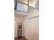 A hallway with storage closets and overhead view of living space at 7691 Red Robin Trl, Denver, NC 28037