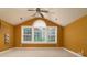 Sunny bedroom with a vaulted ceiling, large windows, and neutral carpet offering a serene retreat at 9913 Hazelview Dr, Charlotte, NC 28277