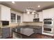 Bright kitchen featuring stainless steel appliances, granite countertops, and custom cabinets at 9913 Hazelview Dr, Charlotte, NC 28277