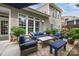 Cozy back patio with comfortable seating, perfect for outdoor gatherings and relaxation at 10206 Linksland Dr, Huntersville, NC 28078