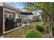 Outdoor patio with furniture, grill, and dining space perfect for backyard entertainment at 10206 Linksland Dr, Huntersville, NC 28078