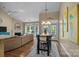Dining area and living area with fireplace and a couch at 10206 Linksland Dr, Huntersville, NC 28078