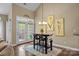 Dining area table with decorations and seating for four people at 10206 Linksland Dr, Huntersville, NC 28078