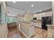 Kitchen with granite countertops, stainless steel appliances, and an open layout at 10206 Linksland Dr, Huntersville, NC 28078