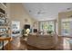 Bright living room features hardwood floors, a fireplace, and an abundance of natural light at 10206 Linksland Dr, Huntersville, NC 28078