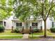 Charming single-Gathering home with a welcoming front porch and well-manicured lawn at 10515 Royal Winchester Dr, Charlotte, NC 28277