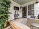 Outdoor patio features outdoor furniture, a tv, a fan, and a brick base at 10515 Royal Winchester Dr, Charlotte, NC 28277