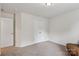 Bedroom showing carpeted floors, double closet, neutral walls, and overhead lighting at 107 Sequoia St, Mooresville, NC 28117