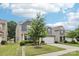 Charming two-story home with stone accents, neutral siding, a well-manicured lawn, and a two-car garage at 107 Sequoia St, Mooresville, NC 28117