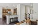 Open kitchen featuring granite countertops, stainless steel appliances, and a breakfast bar with seating at 107 Sequoia St, Mooresville, NC 28117