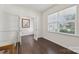 Office space with hardwood floors, a window, a double-door entrance, and a neutral color scheme at 107 Sequoia St, Mooresville, NC 28117