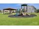 Community playground with slides and covered picnic area; perfect for outdoor fun and Gathering gatherings in the neighborhood at 107 Sequoia St, Mooresville, NC 28117