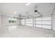Spacious three car garage with multiple doors and windows at 111 Monbo Meadows Ln, Statesville, NC 28677