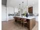 Spacious kitchen island with seating and stylish pendant lighting at 111 Monbo Meadows Ln, Statesville, NC 28677