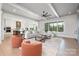 Bright, open living space with seamless flow between kitchen, dining, and living areas at 111 Monbo Meadows Ln, Statesville, NC 28677