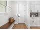 Mudroom features built-in bench, storage cabinets, and convenient access to the home's interior at 111 Monbo Meadows Ln, Statesville, NC 28677