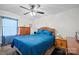 Bedroom featuring ceiling fan and dark wooden bedroom set at 112 Gays Chapel Rd, Statesville, NC 28625