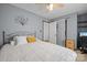 Light filled bedroom featuring standard ceiling fan and neutral walls at 112 Gays Chapel Rd, Statesville, NC 28625
