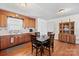Eat-in kitchen with wooden cabinets and hardwood floors at 112 Gays Chapel Rd, Statesville, NC 28625