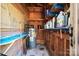 Well-organized storage room with water heater, shelving and ample space for all your storage needs at 112 Gays Chapel Rd, Statesville, NC 28625