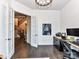 Bright office with french doors and transom windows, overlooking stairway at 121 Enclave Meadows Ln, Matthews, NC 28104