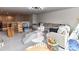 Spacious playroom featuring a sectional sofa, climbing gym, and a variety of toys and play areas at 121 Enclave Meadows Ln, Matthews, NC 28104